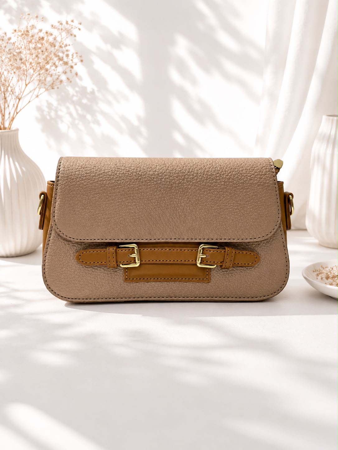 Pebbled Buckle-Strap Saddle Bag