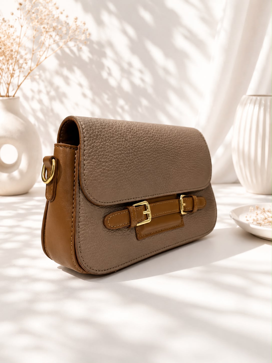 Pebbled Buckle-Strap Saddle Bag