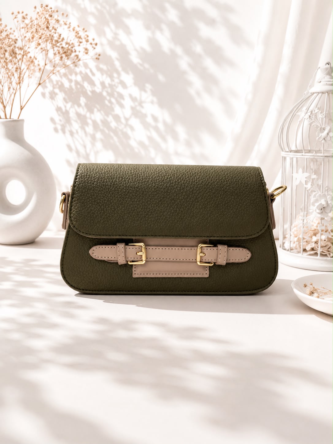 Pebbled Buckle-Strap Saddle Bag