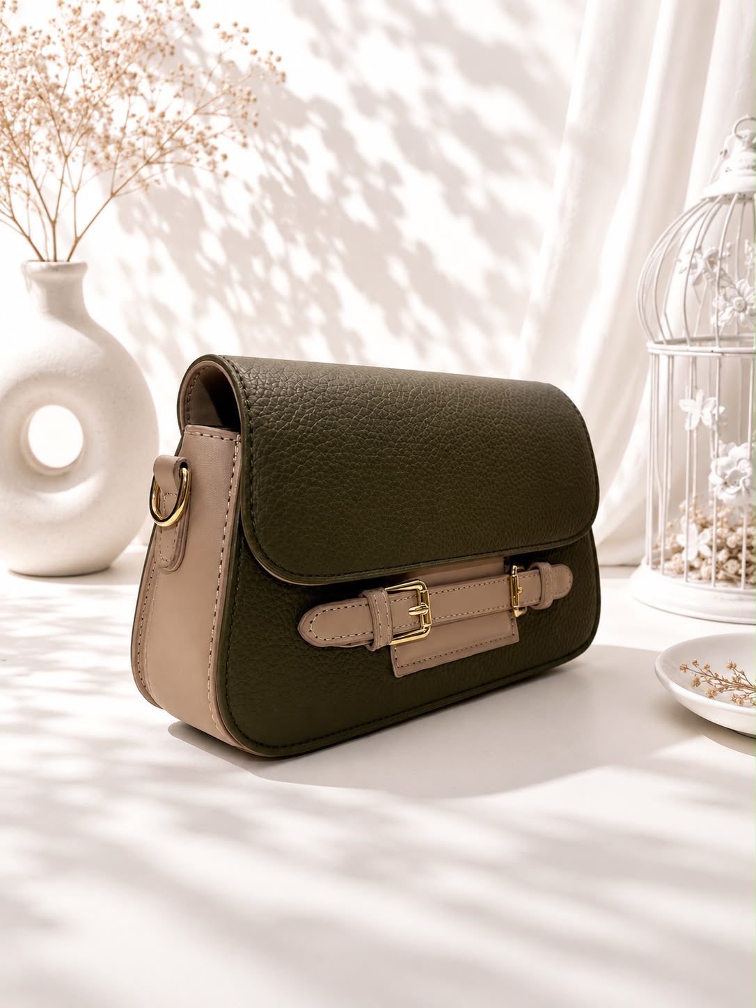 Pebbled Buckle-Strap Saddle Bag