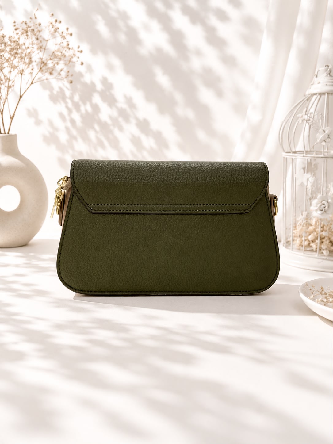 Pebbled Buckle-Strap Saddle Bag