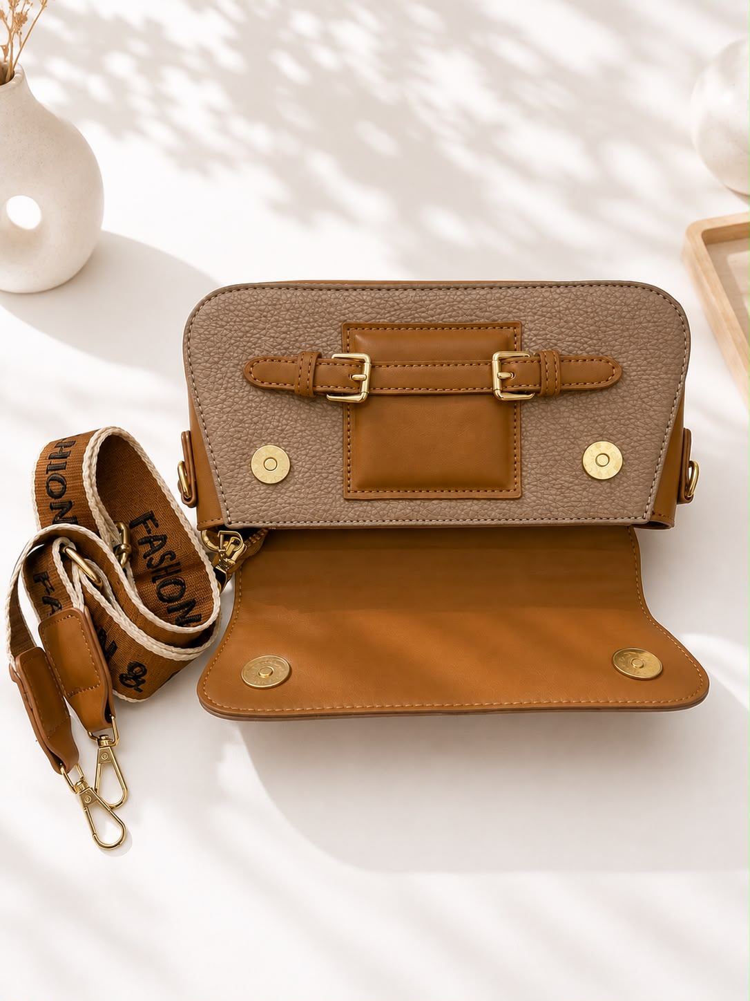 Pebbled Buckle-Strap Saddle Bag