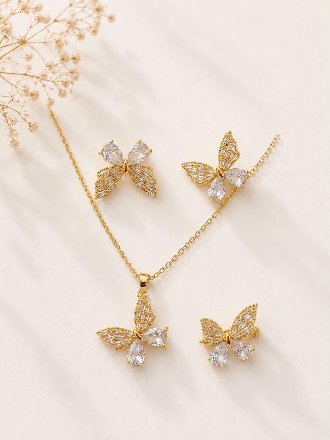 Crystal Butterfly Jewelry Set - flat lay with necklace, earrings and ring