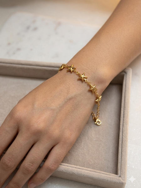 Cherry Blossom Charm Bracelet - gold chain with cherry, clover and flower charms