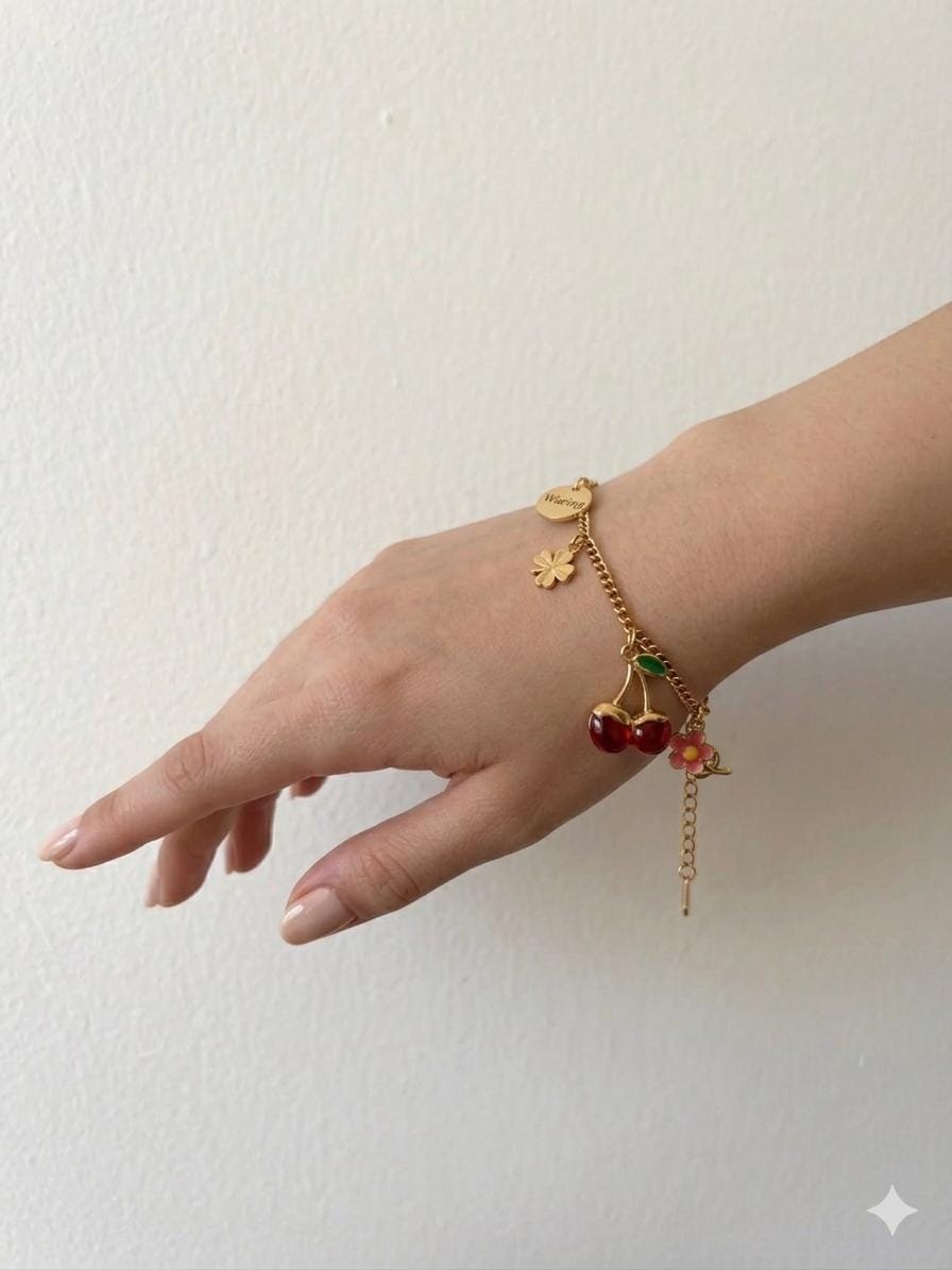 Cherry Blossom Charm Bracelet - gold chain with cherry, clover and flower charms