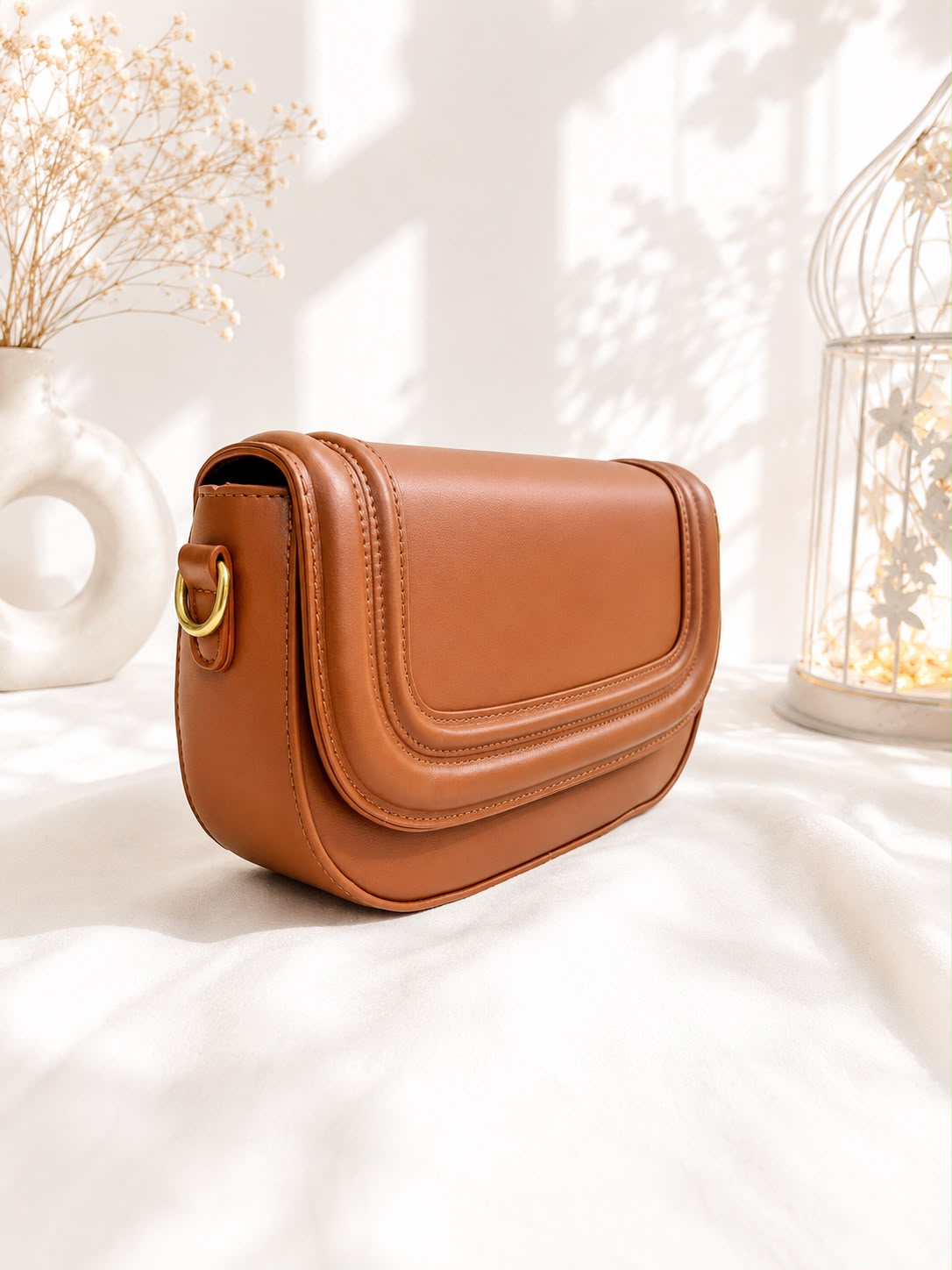 Leather Sling Bag - Brown with straps flat lay