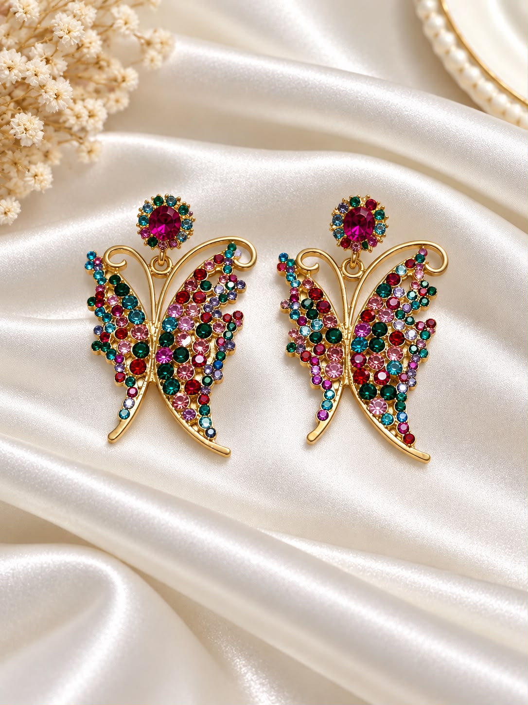 Gold-tone butterfly earrings with multicoloured stones