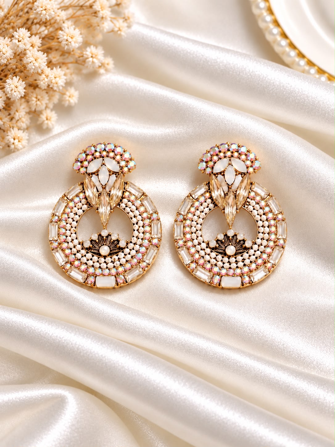 Ivory circular statement earrings with clear and shimmering stones