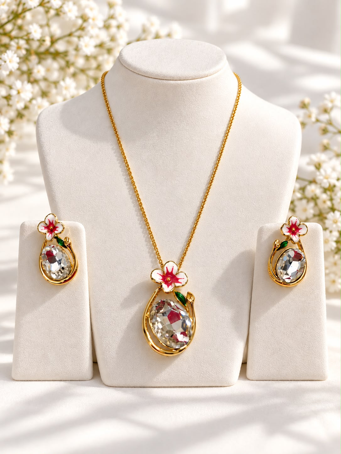 Pink Blossom Crystal Pendant Set with matching earrings on display - The Decus