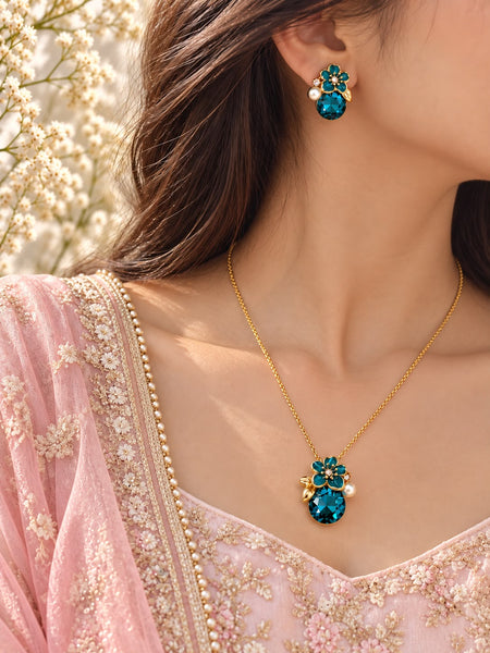 Model wearing Teal Blossom Crystal Pendant Set with pink ethnic outfit - The Decus