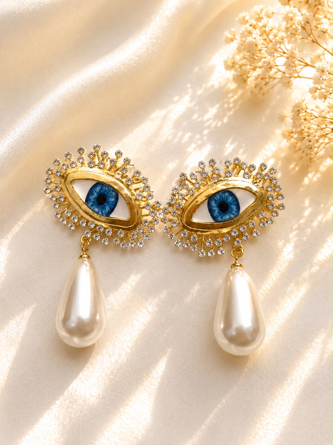 Evil Eye Pearl Teardrop Earrings - model wearing