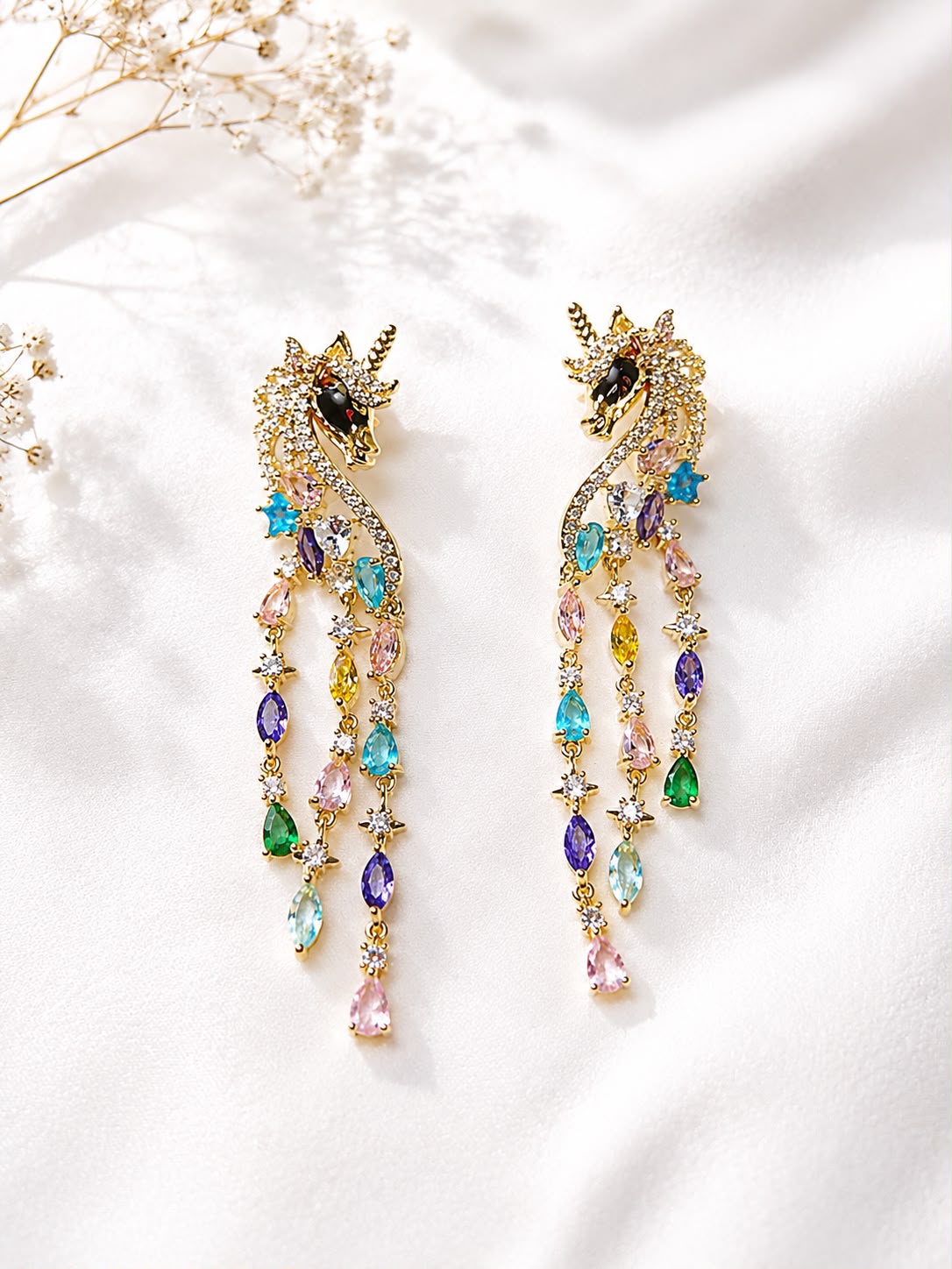 Long gold unicorn cascade tassel earrings with rainbow crystal strands